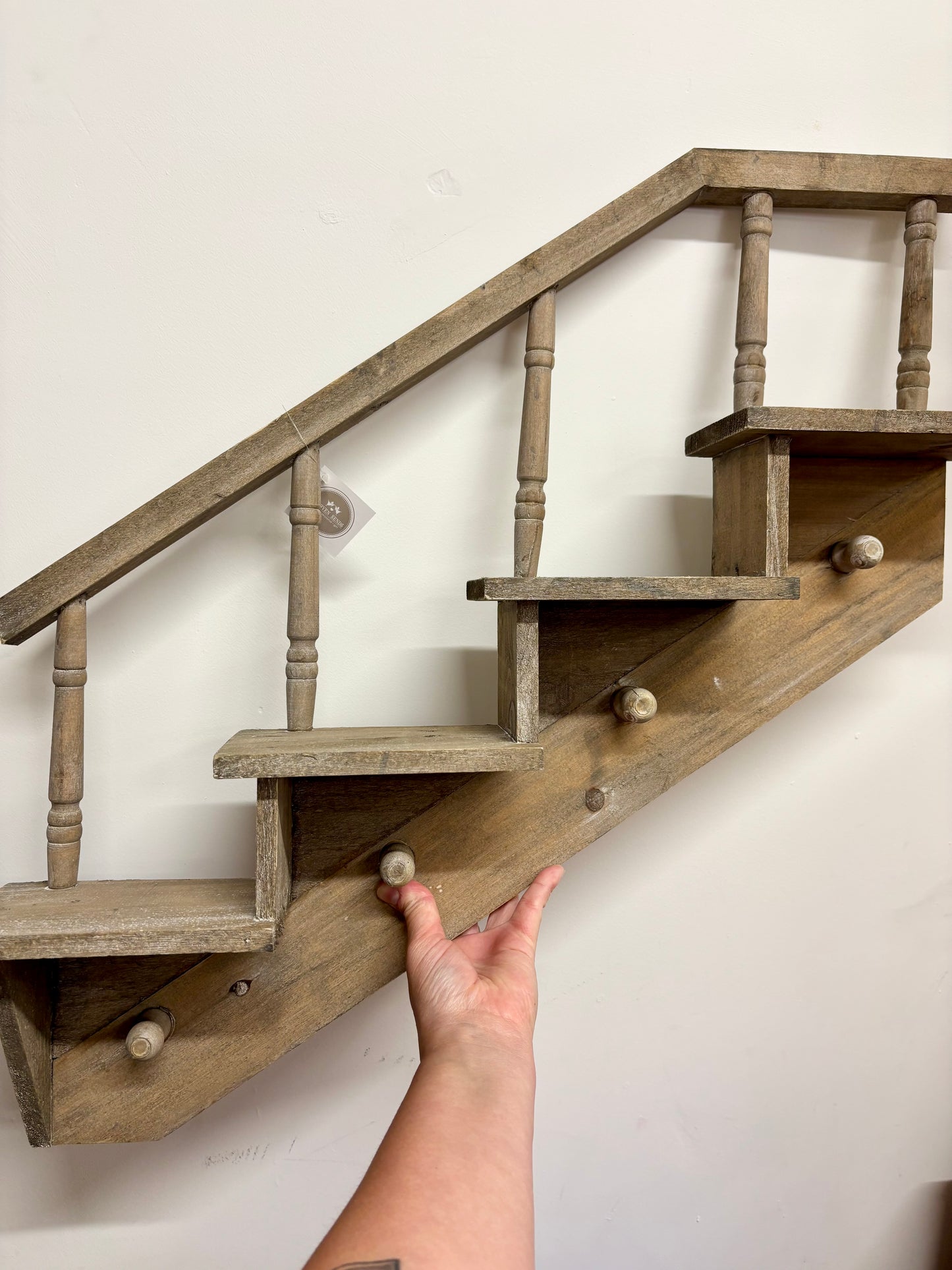 Wooden staircase shelf