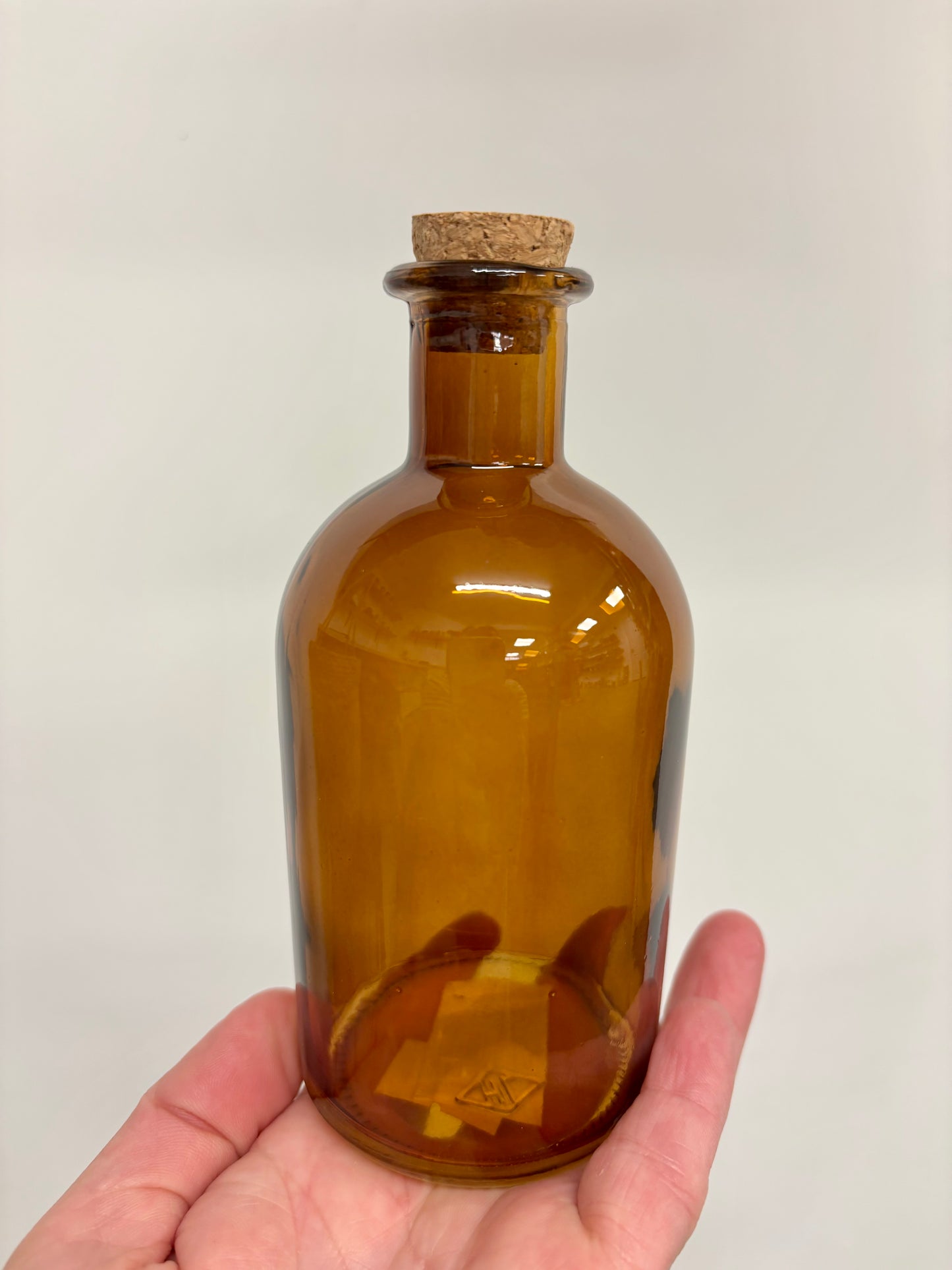 Cork topped brown bottle