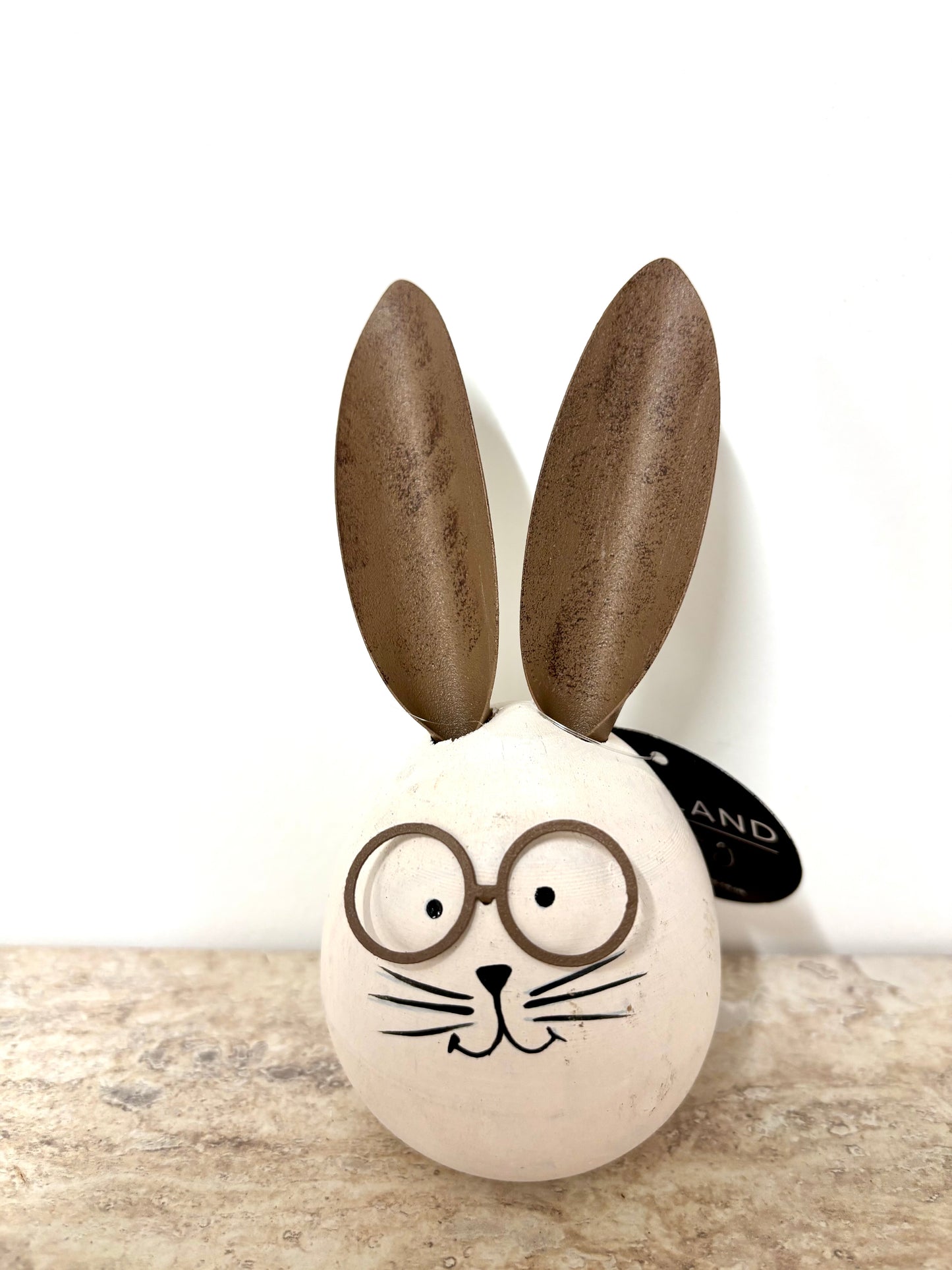 Wooden rabbit with glasses