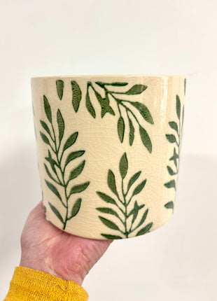 Green leaf plant pot medium