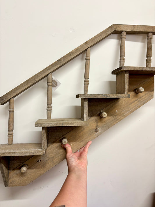 Wooden staircase shelf