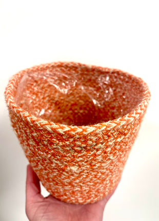 Orange wicker pots