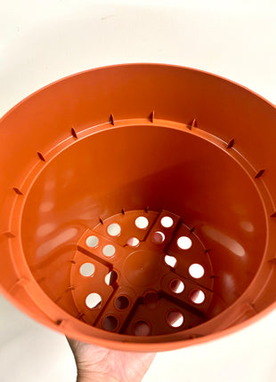 Nursery re-potting pot