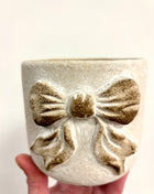 Bow plant pot