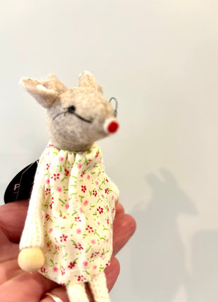 Mouse sitting in floral dress