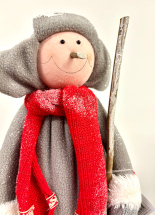 Boy with snow shovel