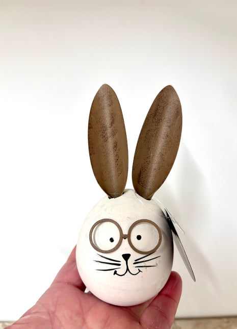Wooden rabbit with glasses