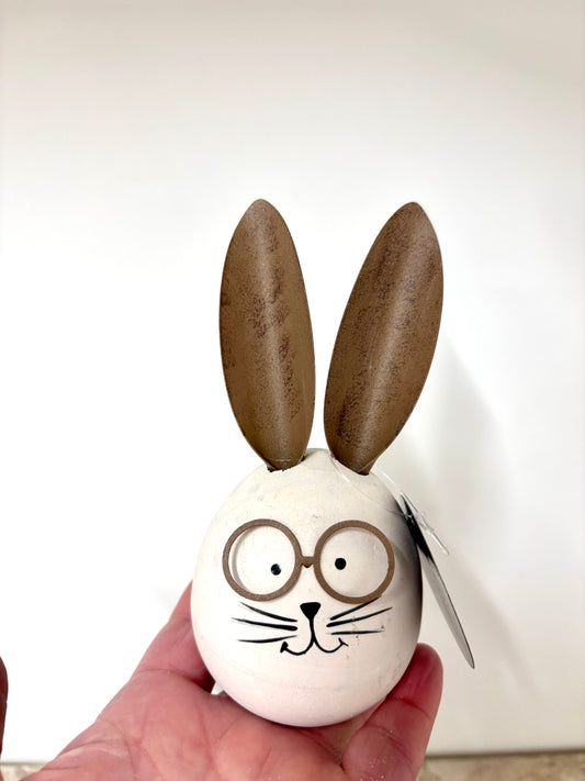 Wooden rabbit with glasses