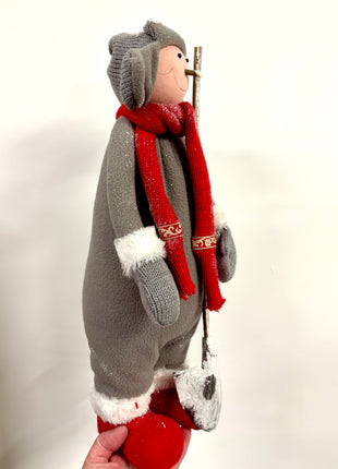 Boy with snow shovel