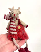 Mouse sitting with scarf