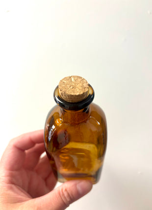 Brown square top bottle