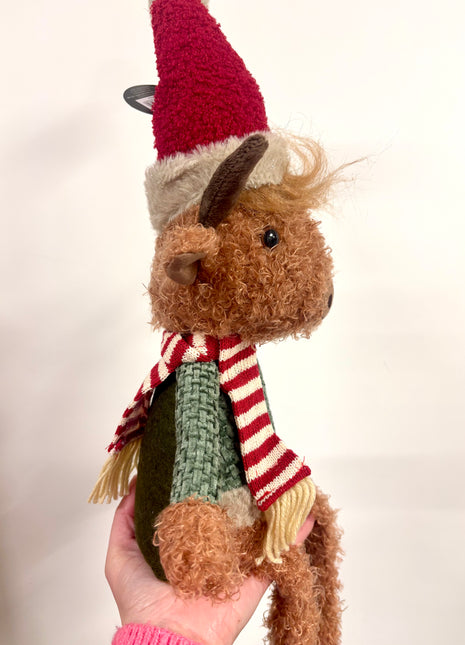 Highland cow with hat