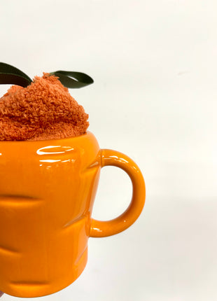 Carrot shaped mug with socks