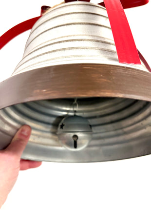 Metal bell with rope