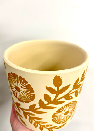 Yellow floral plant pot