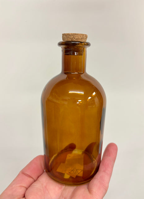 Cork topped brown bottle