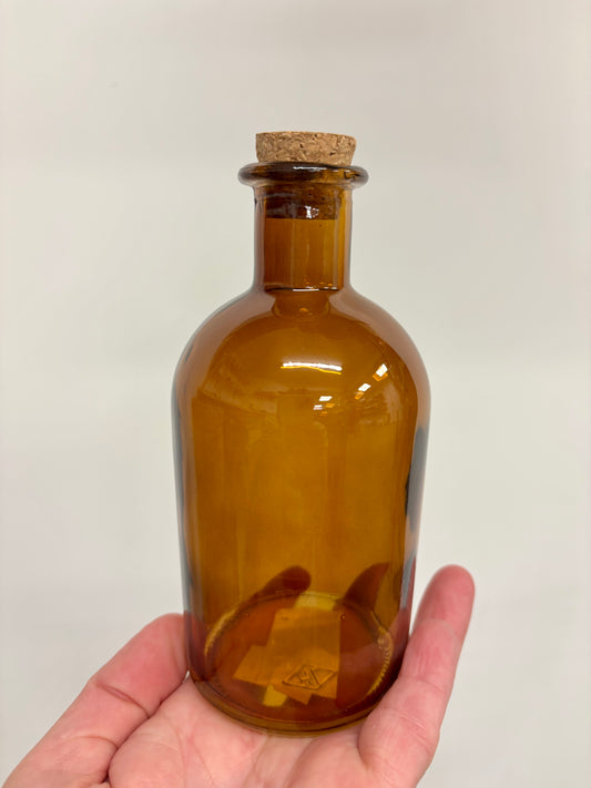 Cork topped brown bottle