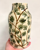 Green foliage vase