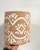 Terracotta pot on feet