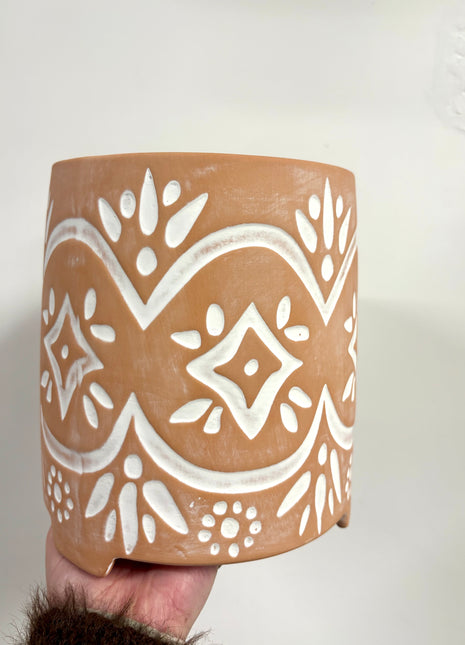 Terracotta pot on feet
