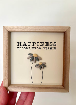 Happiness pebble sign