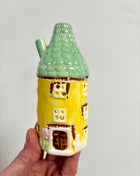 Yellow house ornament