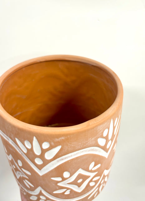 Terracotta pot on feet