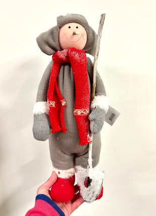 Boy with snow shovel