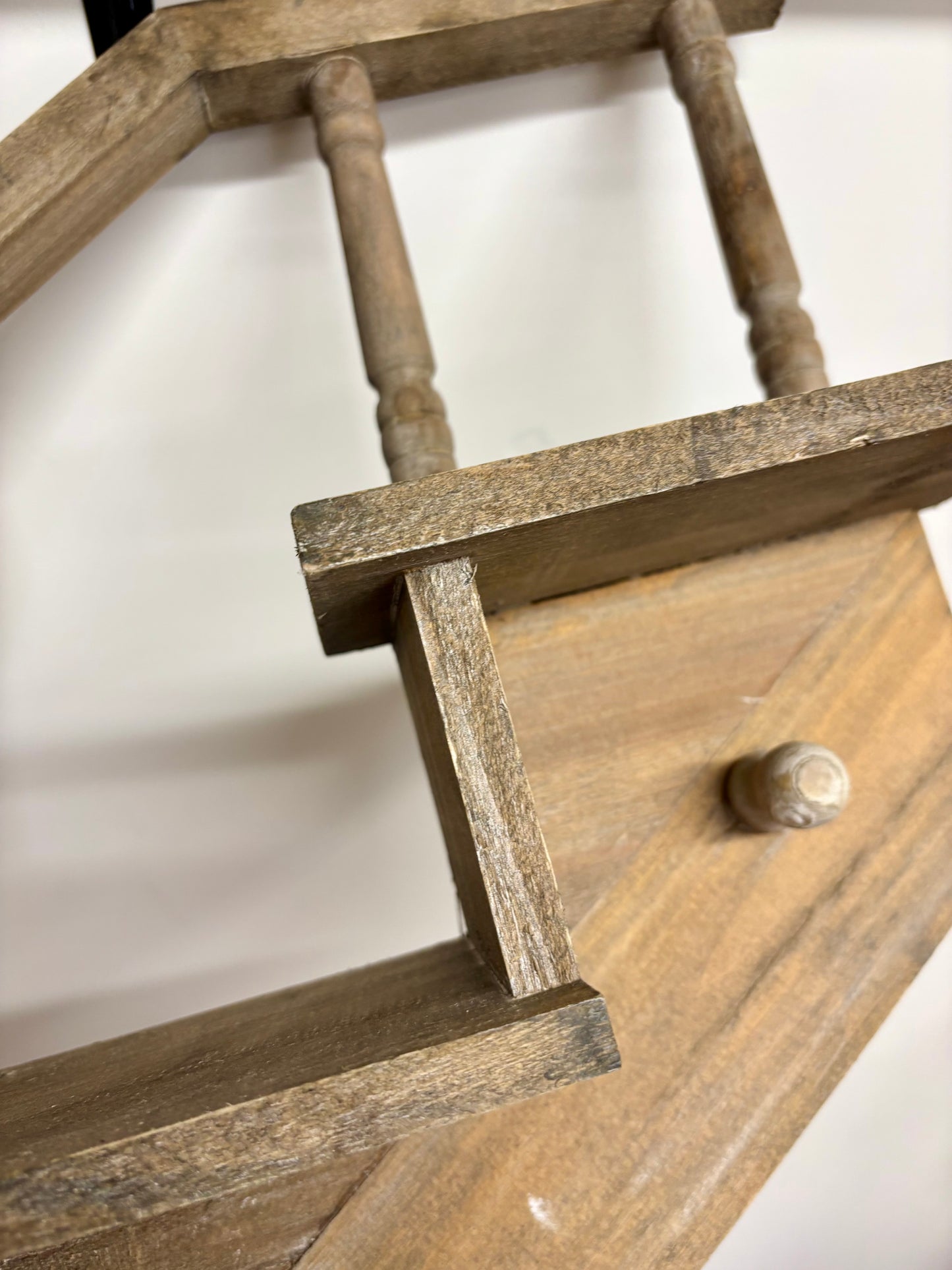 Wooden staircase shelf