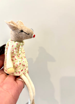 Mouse sitting in floral dress