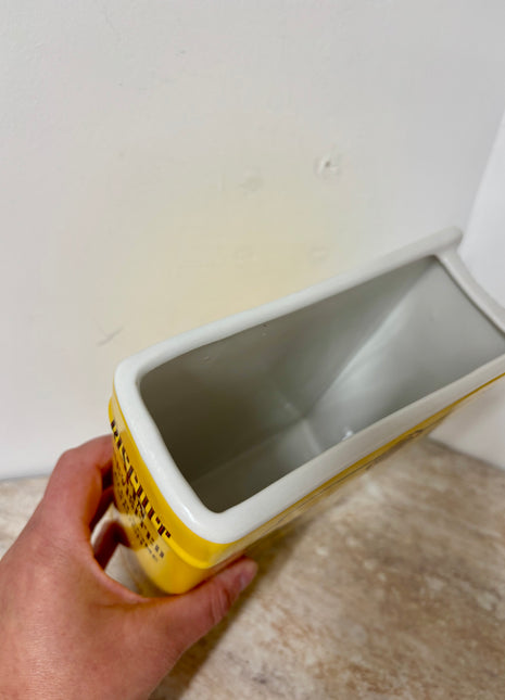 Book vase biscuit tin