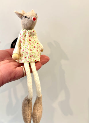 Mouse sitting in floral dress