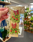 Mistletoe with red bows hangers
