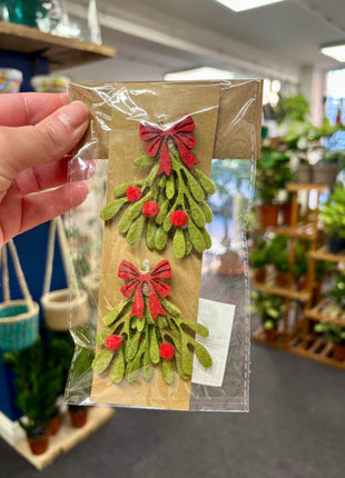 Mistletoe with red bows hangers