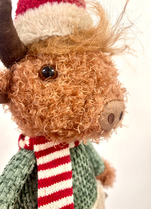 Highland cow with hat