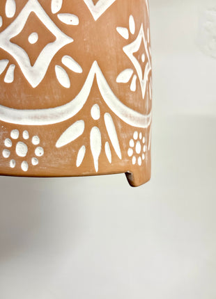 Terracotta pot on feet